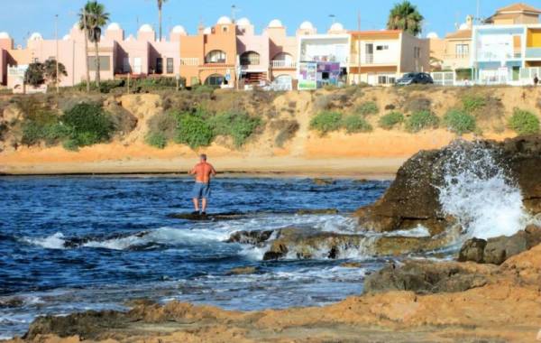 One of the many coves stretching from Punta Prima, Playa Flamenca, La Zenia and Cabo Roig, 